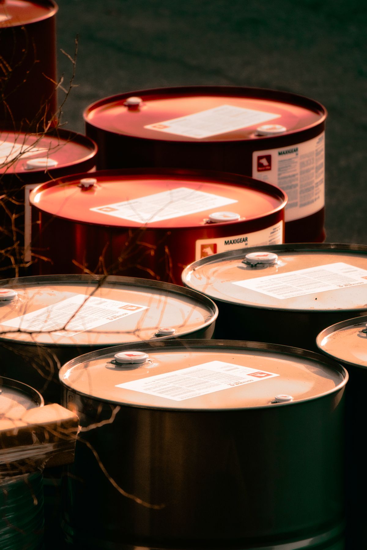 Industrial steel drums arranged for storage