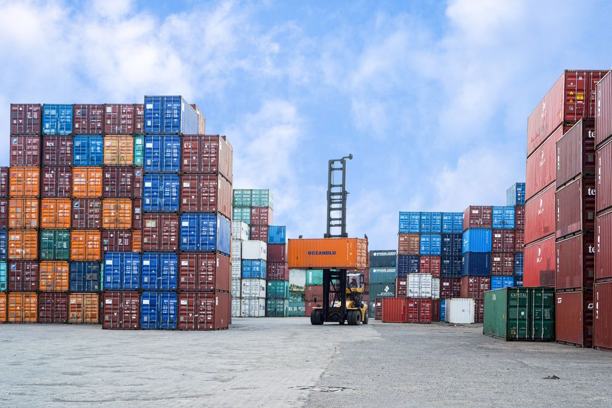 Container stacks and handling equipment in a port yard