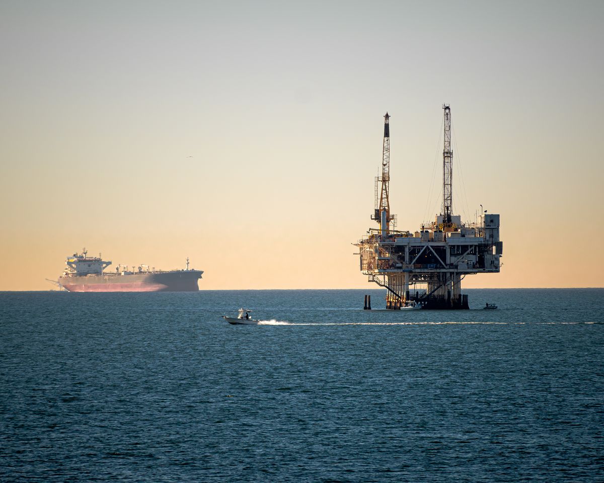 Offshore energy platform and vessel at sea