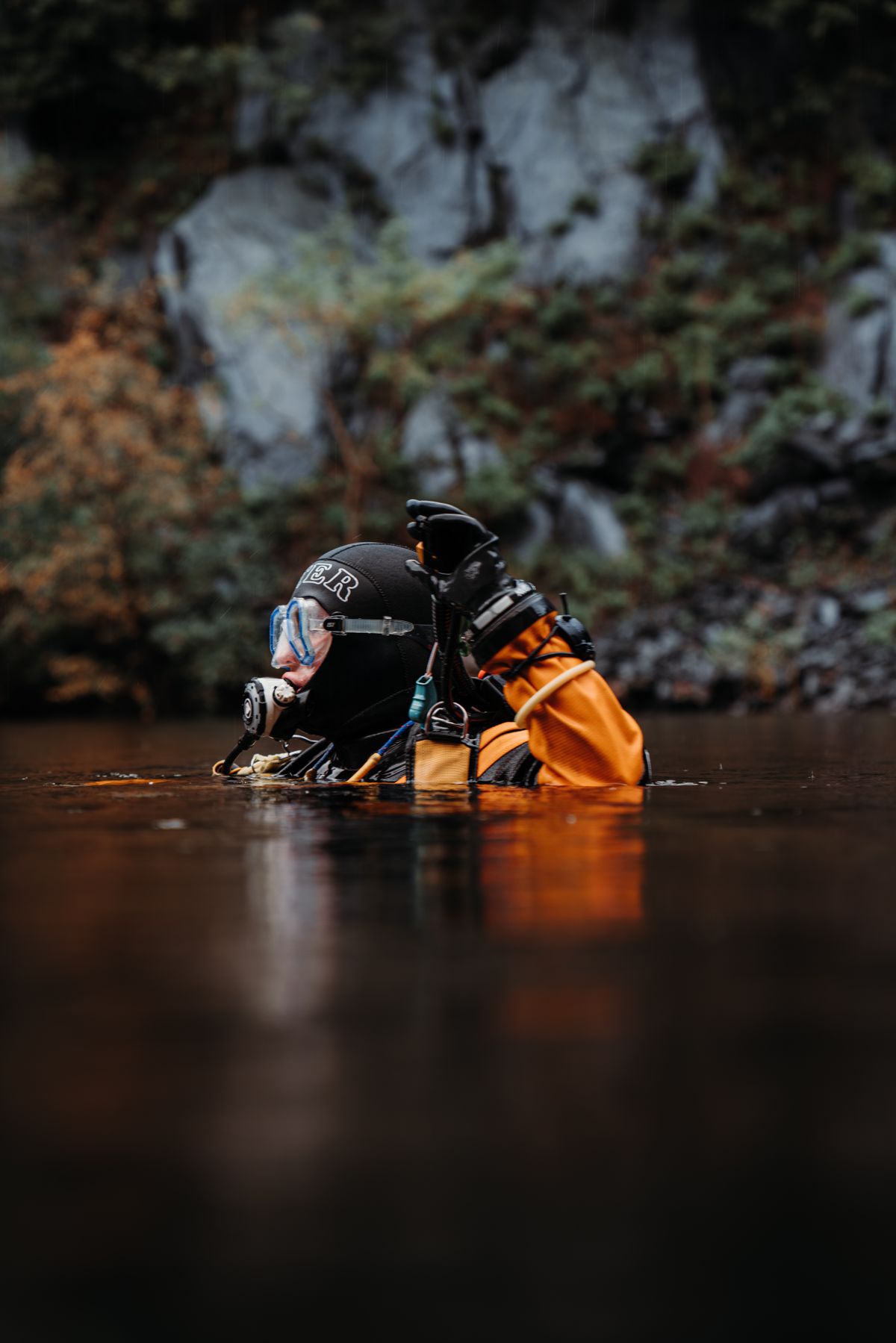 Scuba diver wearing underwater breathing equipment